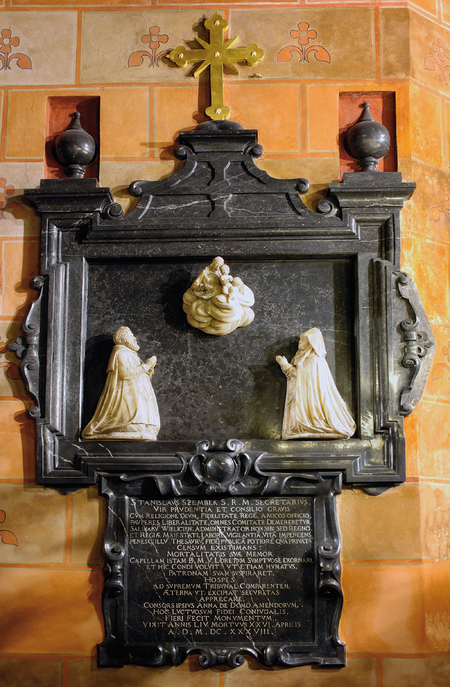 Tablica z czarnego marmuru i alabastru wyobrażająca zmarłe małżeństwo Stanisława i Annę Szembeków
adorujących Matkę Boską i Dzieciątko, wystawiona w 1638 roku w kościele Mariackim w kaplicy Matki Boskiej Laterańskiej z fundacji syna