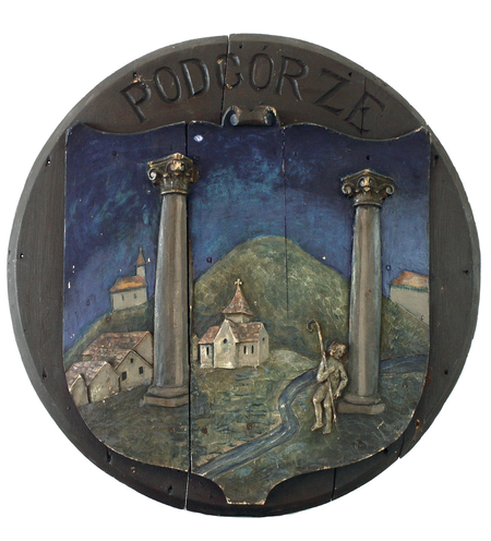 Tondo z herbem Podgórza. Zachowany egzemplarz z kompletu herbów zamówionych przez radę miejską na przełomie lat siedemdziesiątych
i osiemdziesiątych XIX wieku dla oznaczenia granic miasta na jego rogatkach (Archiwum Narodowe w Krakowie)