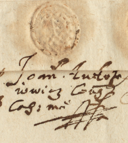 Pieczęć papierowa na podkładzie woskowym z herbem mieszczańskim (gmerkiem) mieszczańskim oraz podpis Jana Jędrzejowicza
z aktu wydanego w roku 1601 (Archiwum Narodowe w Krakowie, sygn. rkps AD 165, s. 158)
