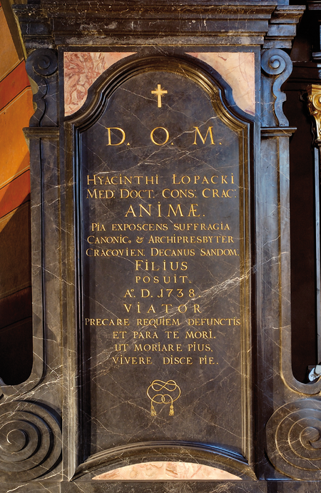 Nagrobek Jacka Łopackiego w nawie północnej kościoła Mariackiego, ufundowany w 1738 roku przez jego syna,
księdza Jacka Augustyna Łopackiego, archiprezbitera kościoła Mariackiego