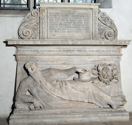 Wykonany w kamieniu pińczowskim pomnik nagrobny zmarłego
w 1580 roku rajcy i burmistrza Jana Mrowińskiego Płoczywłosa,
wystawiony jeszcze za jego życia, w 1577 roku, w krużganku klasztornym
kościoła św. Katarzyny w Krakowie