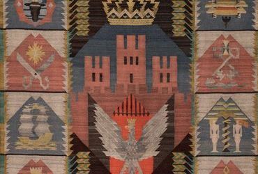 (578) Rok 1928 – darowany Radzie Miejskiej przez krakowskich rzemieślników kilim do Sali
Obrad, z herbem Krakowa oraz godłami cechowymi; zdobi salę do dziś (z zasobów UMK)