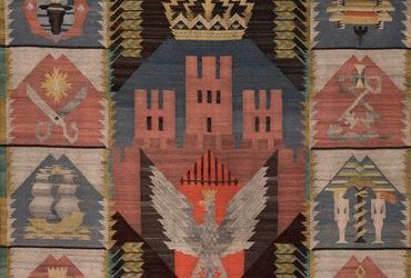 (578) Rok 1928 – darowany Radzie Miejskiej przez krakowskich rzemieślników kilim do Sali
Obrad, z herbem Krakowa oraz godłami cechowymi; zdobi salę do dziś (z zasobów UMK)